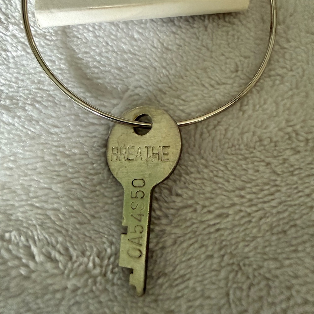 The Giving Key BREATHE Key Charm bracelet in Antique Silver Tone